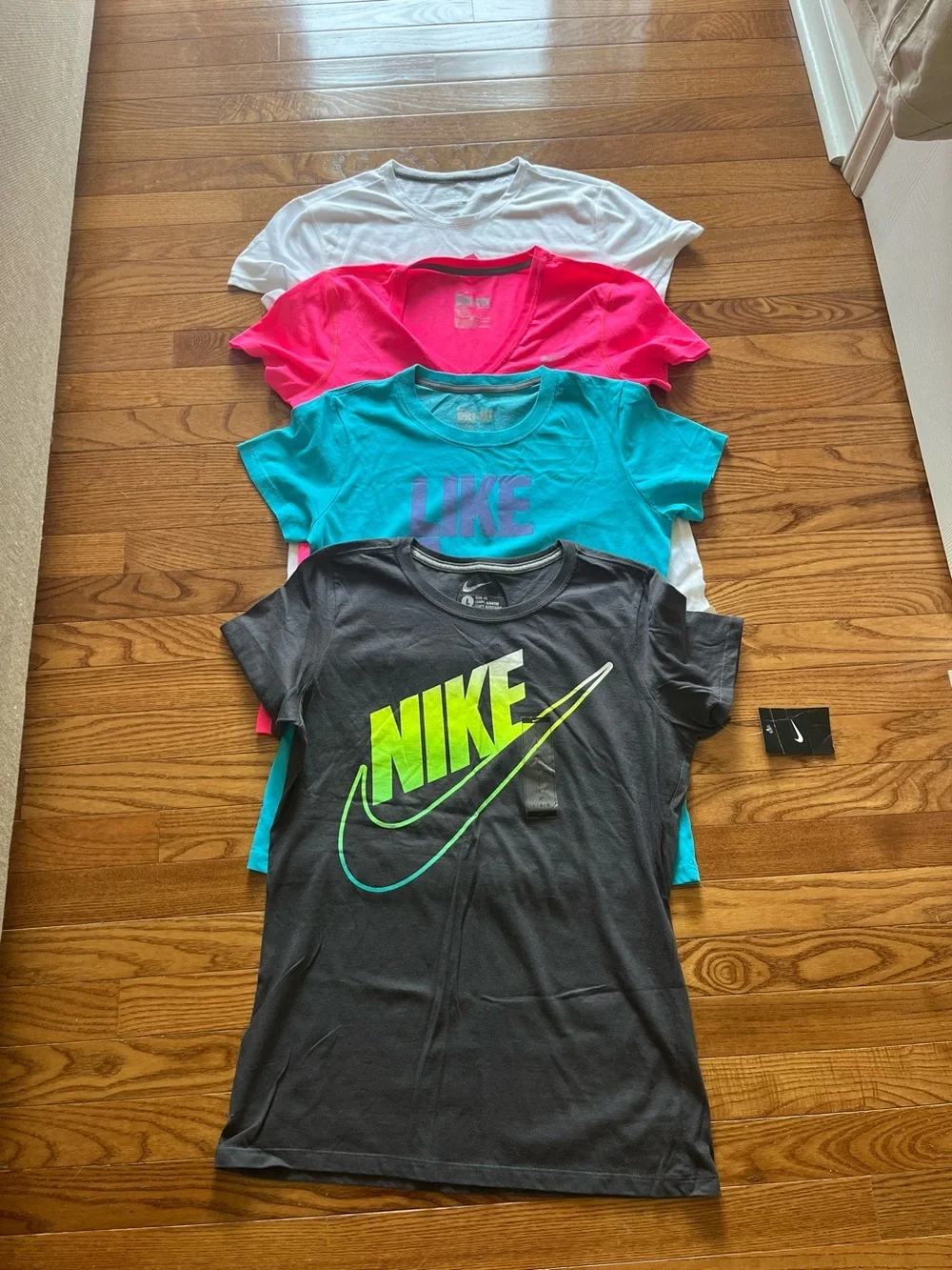 Nike ladies Short Sleeve Tee Stack - Black, Teal, Pink, White